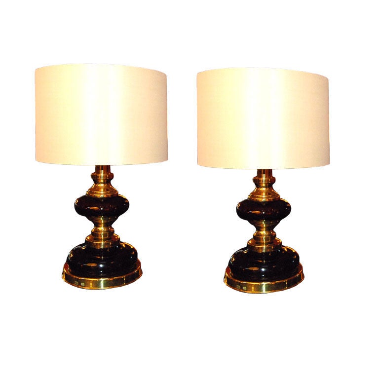 Pair of Italian table lamps with purple glass, brass base and silk shades.