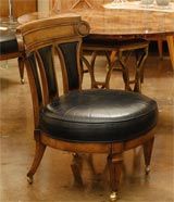 Set of four original chairs on caster by Monteverdi-Young (original leather and tag).