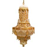 LOUIS XVI STYLE GILT BRONZE AND CRYSTAL CHANDELIER