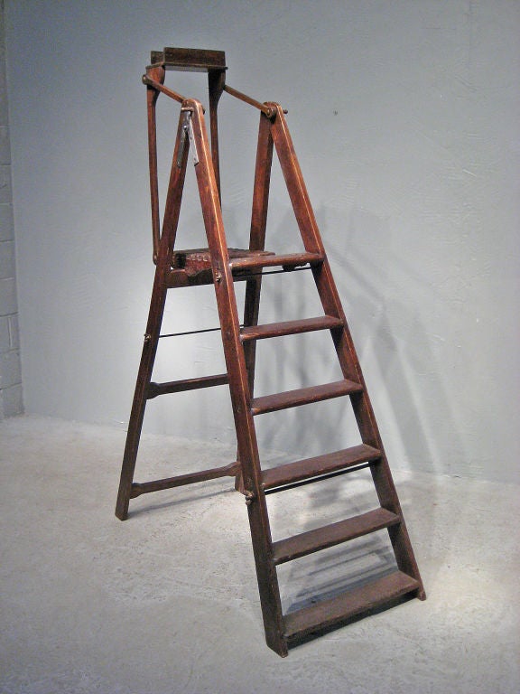 A superb artist or library folding ladder made of oak with mortise construction and original hardware. More photos available upon request. More antiques available at www.ofleury.com