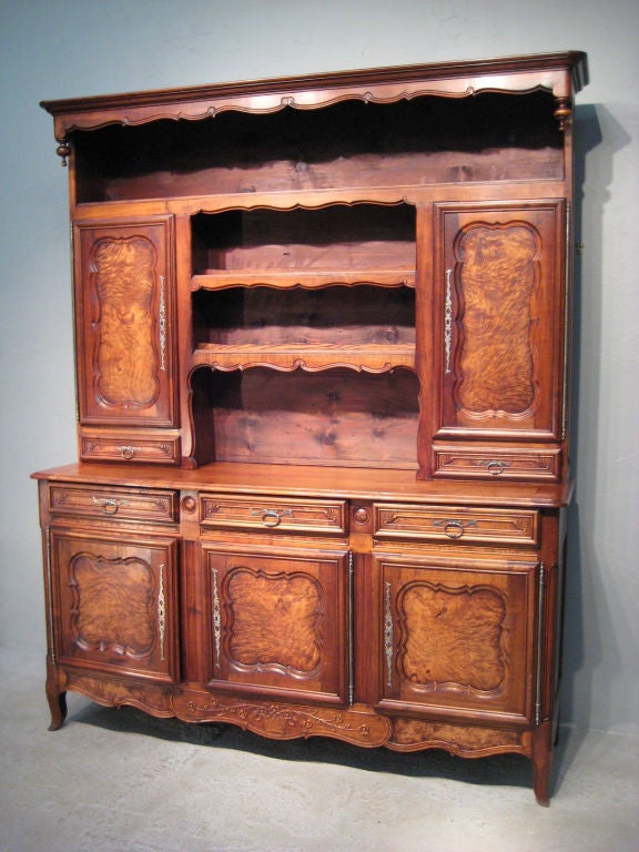 A beautiful vaisellier from the Burgundy Province made of cherry and burl of elm wood. In perfect condition with ample storage. Beautiful patina and carvings.

MORE ANTIQUES AVAILABLE AT WWW.OFLEURY.COM