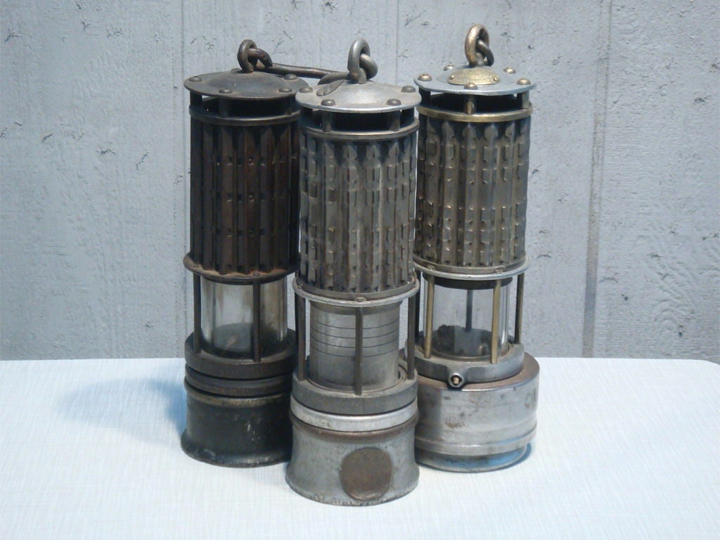 early 20th century miners' lamps<br />
new york and pittsburgh - usa<br />
oil lamp capacity<br />
decorative <br />
::AS SET - $600.00::<br />
::INDIVIDUALLY - $250.00::