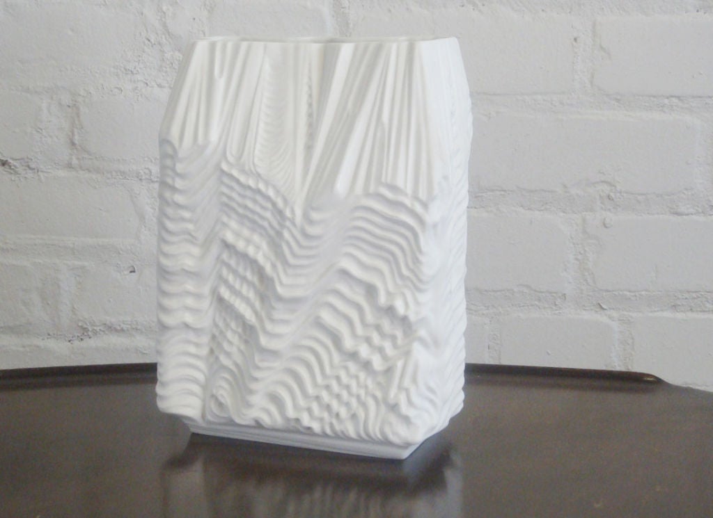 waved topographical matte porcelain vase with a glass interior