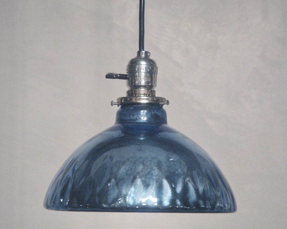 two blue mercury Glass pendant lights<br />
individually: $1600.00<br />
as pair: $3000.00