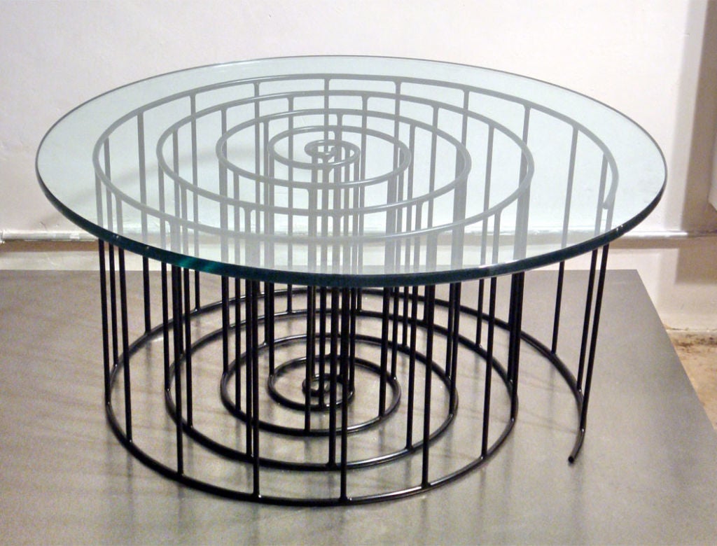 designed by Cameron Slocum for Gallery L7<br />
hand forged wrought iron coffee table inspired by Russian architect Vladimir Tatlin's 