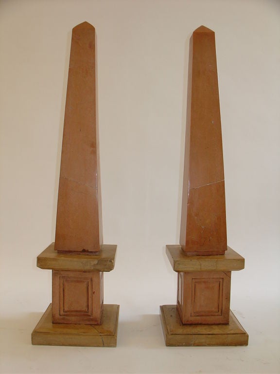 Grand Tour style Italian marble obelisks. These are quite large.
Nembro rosato marble was a favorite choice for Greek and Roman sculptors. 
It has long developed a reputation of refined taste in the decorative arts.