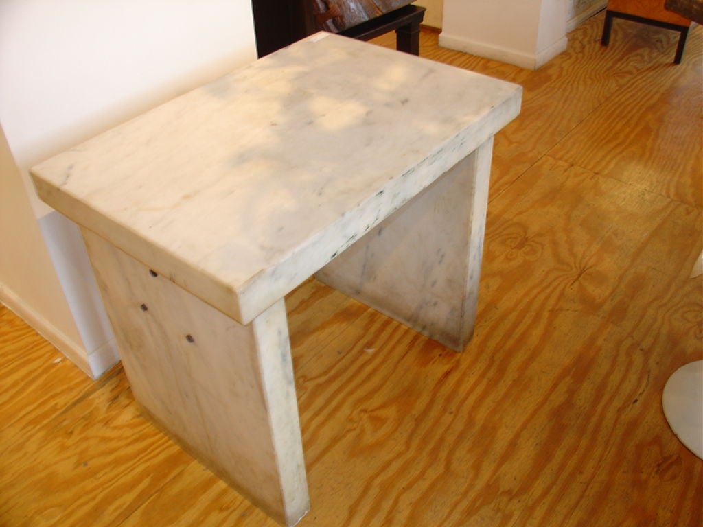 Substantial Marble Table. The Marble is three inches thick. Could be used indoors or outdoors.
