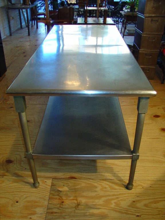 Generously proportioned Duparquet Range Company Stainless Steel Kitchen Island originally used in the kitchen of the Union League Club in Chiacgo. Wonderful original legs.