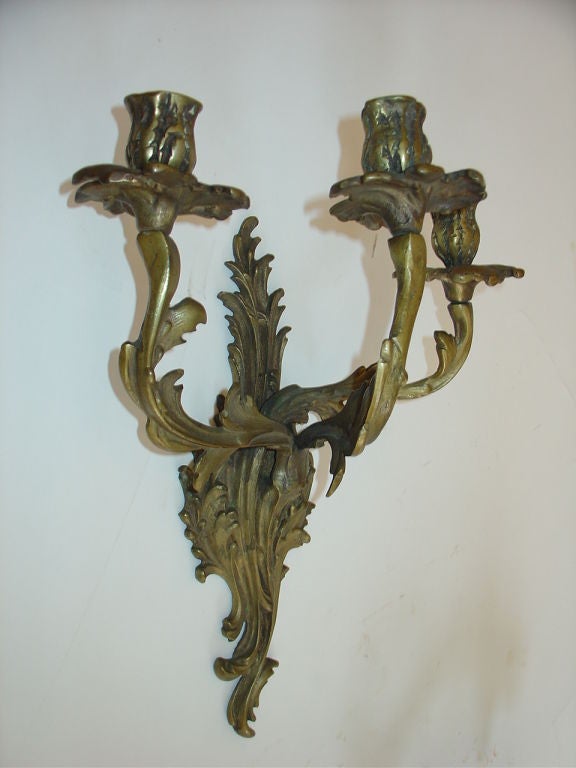French Rococo Louis XV Style Bronze Three-Arm Sconces In Good Condition In Chicago, IL