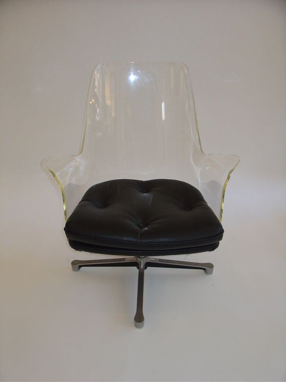 Lucite Swivel Desk Chair with steel base and vinyl upholstered cushion.
