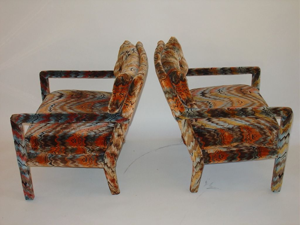 Pair of Milo Baughman Parsons Chairs upholstered in Jack Larson fabric.