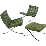 pair of Barcelona lounge chairs and ottoman by Ludwig Mies van der Rohe