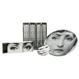 collection of table top accessories by Piero Fornasetti