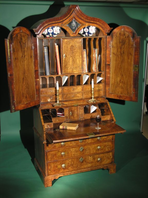 A QUEEN ANNE WALNUT BUREAU BOOKCASE