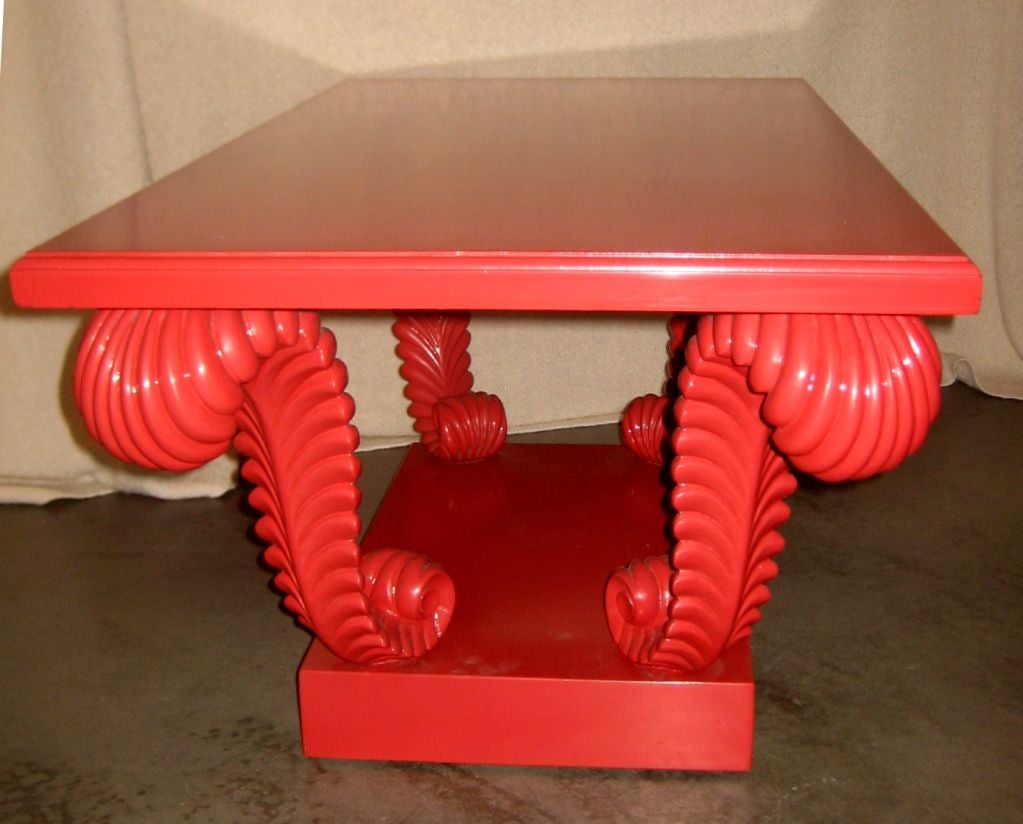 Vintage wood coffee table with carved feather motif