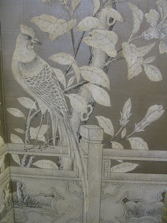 Four panel screen with Chinese handpainted wallpaper applied to front.  Beautifully detailed flower and bird design in tones of white and grey, sanded and glazed to create an aged patina.  Made with french hinges.  The silver tea leaf wallpaper is