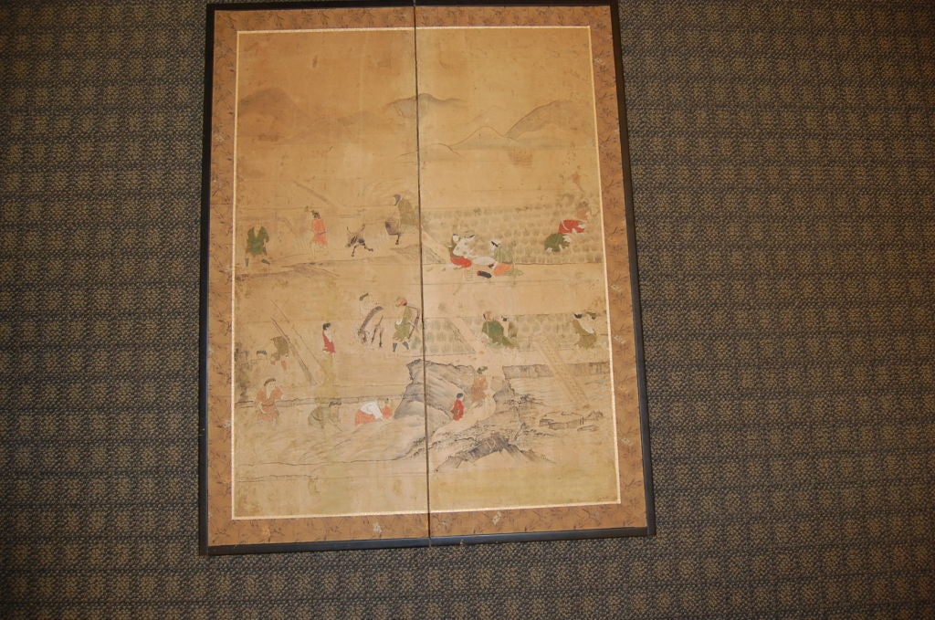 Three Japanese screens, each consisting of two panels.  These screens are handpainted, and date to the 18th century.  They each have landscape and figure design, and depict various aspects of rice cultivation.  The background is brown paper, and