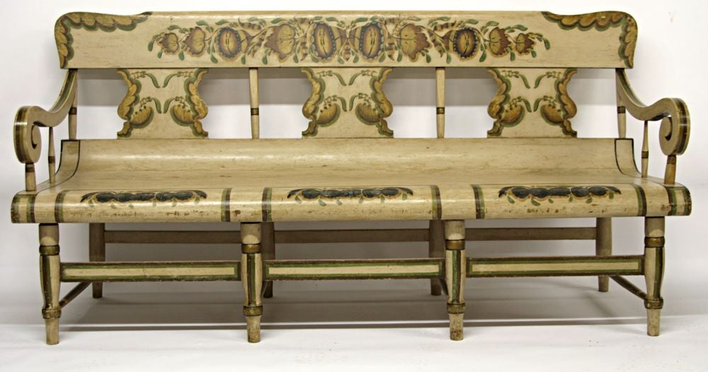 HUGE & WHIMSICAL, PAINT-DECORATED, PENNSYLVANIA SETTEE, made by WILLIAM F. SNYDER, MIFFLINTOWN CHAIR WORKS, JUNIATA COUNTY:<br />
<br />
Paint decorated settee with one of the most bold and recognizable forms in rural Pennsylvania chair-making. 