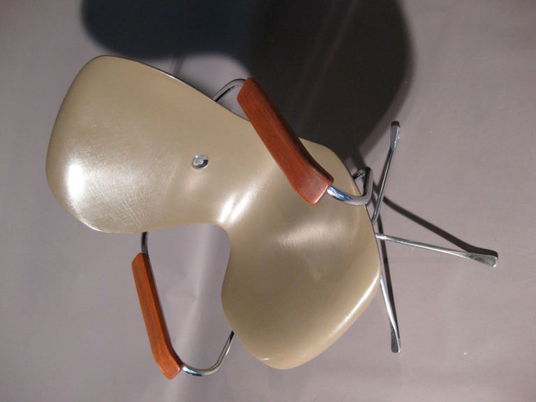 A highly energized armchair designed in 1962 specifically for the restaurant in the Space Needle at the Seattle World's Fair. A rare model with arms.An excellent desk chair. This chair is from the first production by the Ion Corporation of Temple,