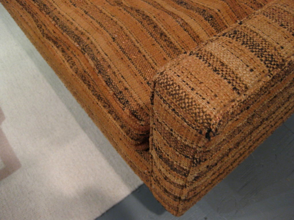 Early classic Edward Wormley sofa with brass legs for Dunbar c.1950's. Needs to be re-upholstered however it still retains the original Dorothy Liebes fabric with metallic threads.