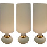 A Set of Three Very Large White Ceramic Lamps