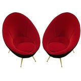 A Pair of Mid Century Barrel Chairs with Brass Legs