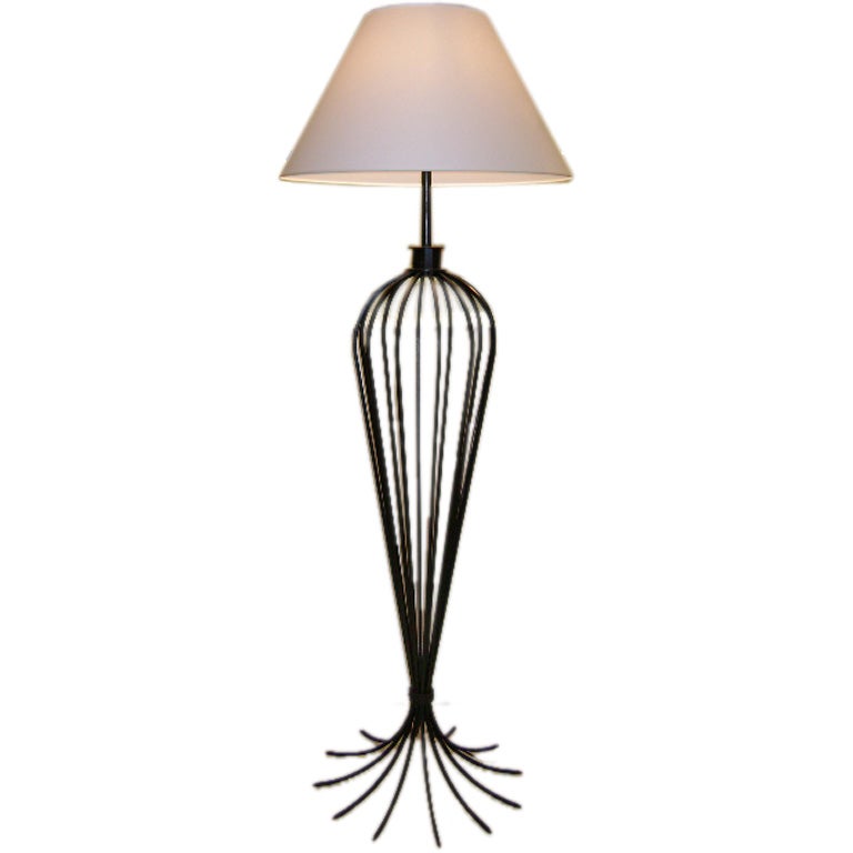 A Wrought Iron Floor Lamp In the Style of Jean Royere