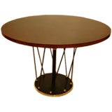 A Round Adjustable Cocktail / Dining Table by Jean Royere