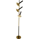 A Brass and Lacquer Three Light Floor Lamp by Oscar Torlasco