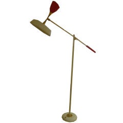 A Mid Century Floor Lamp in Brass and Lacquered Metal