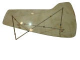 A Modernist Glass Topped Occasional Table