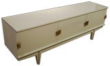 A Low Multi Drawer Console in White Lacquer by Roger Landault