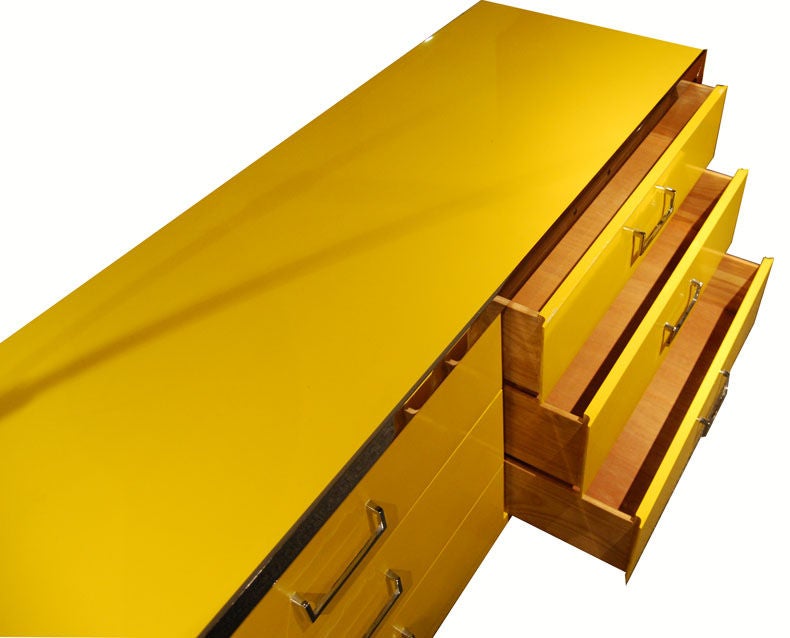 A Chest of Drawers in Yellow Lacquer and Chrome