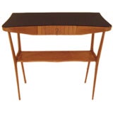 An Italian Console Table in Bleached Walnut and Black Glass