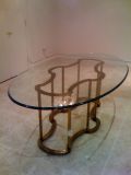 An Oval Glass Topped Custom Dining Table by MasterCraft