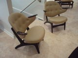 A Pair of Leather and Mahogany Armchairs by Hans Wegner