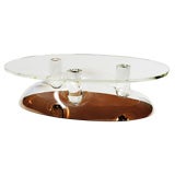A Lucite Oval Cocktail Table by Edmond Vernassa