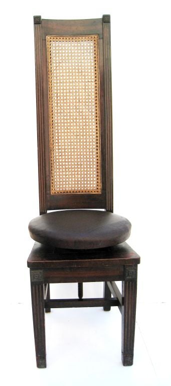 W.D. Allison Physician Stool and Tall Back Rotating Patient Chair. Turn of the 20th Century Design. Original Oil Cloth Seats and Original Caning.