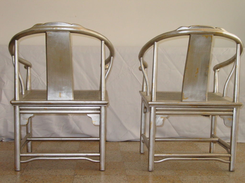 Late 20th Century Pair of Silver Leaf Asian Chairs