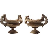 Rare pair of French late 19th/early 20th century cast iron urns