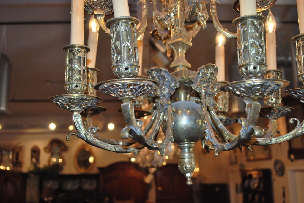 19th Century French Brass 12-arm chandelier For Sale