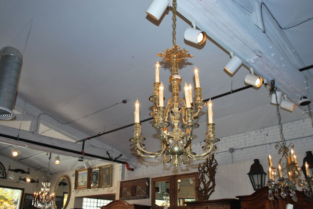French Brass 12-arm chandelier For Sale 1