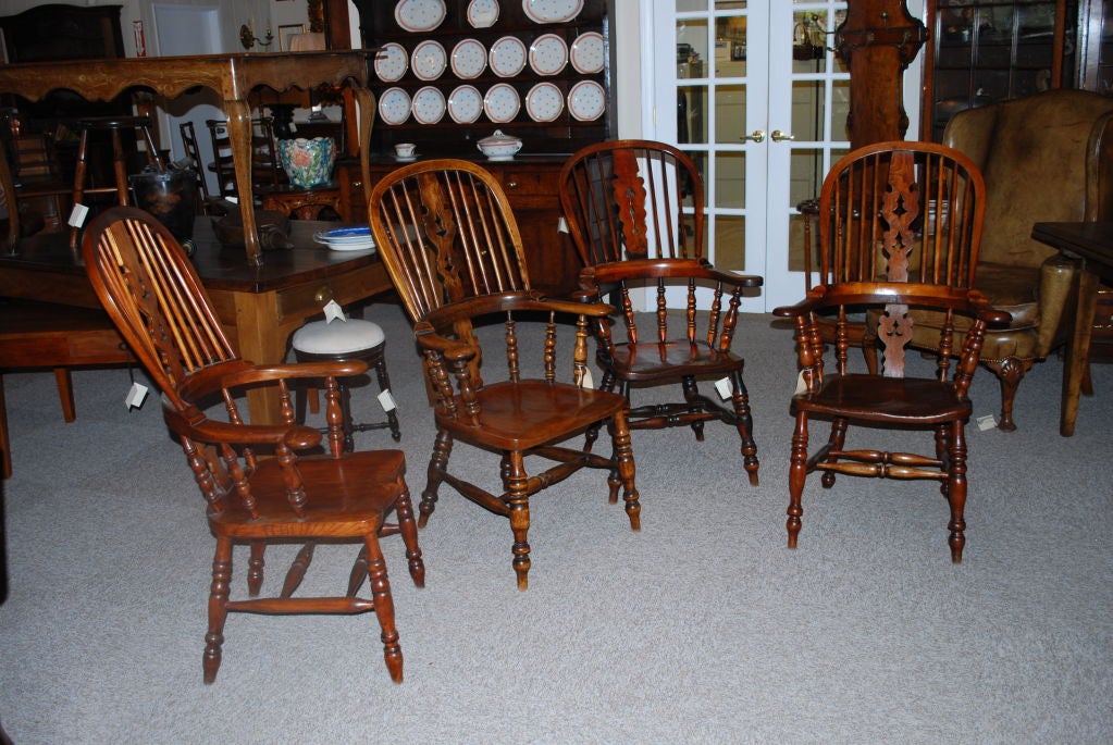 Collection of  broad arm windsor chairs
