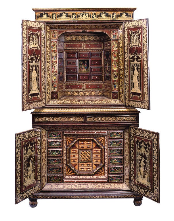 An extraordinary Regency polychrome and monochrome elaborately decorated and fitted penwork cabinet with chinoiserie decoration of figures and pagodas in gardens.