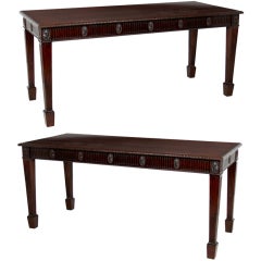 A Large Pair of Mahogany Console Tables in the Adam Taste.