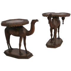 Two Indian carved sandalwood tables modeled as standing camels.
