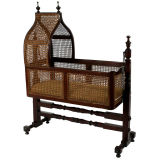 A Victorian Caned Hanging Cradle or Bassinet.