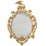 Finely Carved 18th c. Oval Giltwood Mirror with Ho-Ho Bird Crest