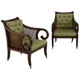 A Pair of Regency Mahogany Cane-Filled Bergeres