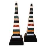 pair of varigated marble obelisks